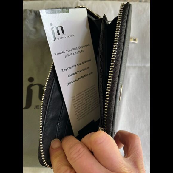 Jessica Moore black wristlet, brand new in a dust bag, 8 x 4.25 in. Handle 6 in.